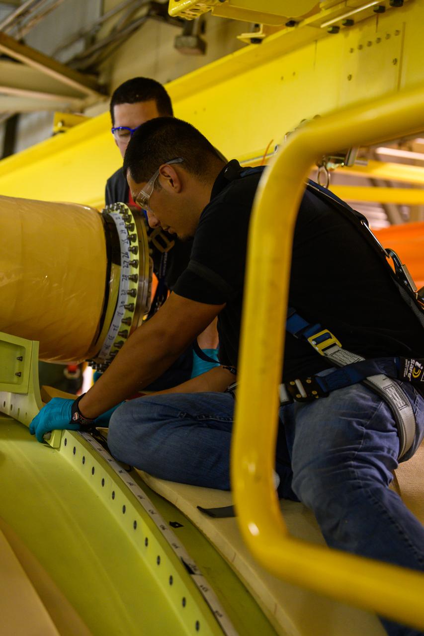 NASA finished assembling and joining the main structural components for the largest rocket stage the agency has built since the Saturn V that sent Apollo astronauts to the Moon. Engineers at the agency’s Michoud Assembly Facility in New Orleans connected the last of the five sections of the Space Launch System (SLS) rocket core stage Sept. 19. The stage will produce 2 million pounds of thrust to send Artemis I, the first flight SLS and NASA’s Orion spacecraft to the Moon. The engine section is located at the bottom of the 212-foot-tall stage and houses the four RS-25 engines. The core stage’s two liquid propellant tanks and four RS-25 engines will produce more than 2 million pounds of thrust to send the SLS rocket and Orion on the Artemis lunar missions. The engine section houses the four RS-25 engines and includes vital systems for mounting, controlling and delivering fuel form the propellant tanks to the rocket’s engines.  Offering more payload mass, volume capability and energy to speed missions through space, the SLS rocket, along with NASA’s Gateway in lunar orbit and Orion, is part of NASA’s backbone for deep space exploration and the Artemis lunar program. No other rocket is capable of carrying astronauts in Orion around the Moon in a single mission.
